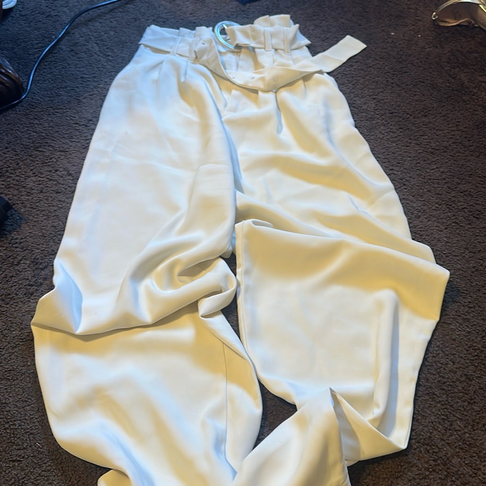 Dress pants, I am 5”6 and fit like this. Size 4